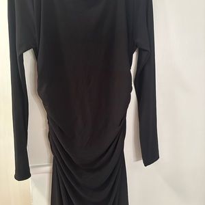 Black Kamali culture stretch dress goes past the knee.Smoke free home.